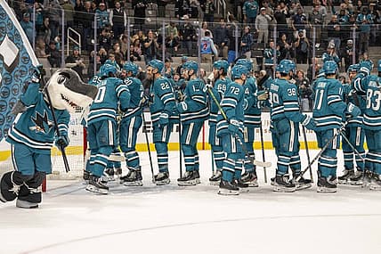Nov 9, 2023; San Jose, California, USA; San Jose Sharks goaltender Mackenzie Blackwood (29) and San Jose Sharks center Ryan Carpenter (22) and San Jose Sharks left wing Fabian Zetterlund (20) and teammates celebrate after the win against the Edmonton Oilers at SAP Center at San Jose. Mandatory Credit: Neville E. Guard-USA TODAY Sports