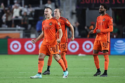Nov 11, 2023; Houston, Texas, USA; Houston Dynamo defender Erik Sviatchenko (28), midfielder Griffin Dorsey (25), and defender Micael (31) react after the game against Real Salt Lake at Shell Energy Stadium. Mandatory Credit: Troy Taormina-USA TODAY Sports