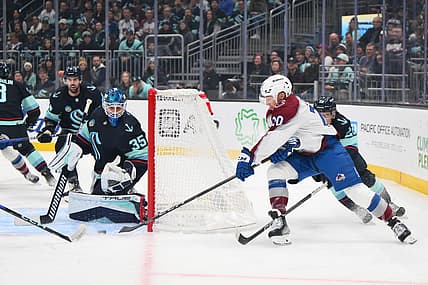 Nov 13, 2023; Seattle, Washington, USA; Seattle Kraken goaltender Joey Daccord (35) blocks a goal shot by Colorado Avalanche center Ross Colton (20) during the first period at Climate Pledge Arena. Mandatory Credit: Steven Bisig-USA TODAY Sports