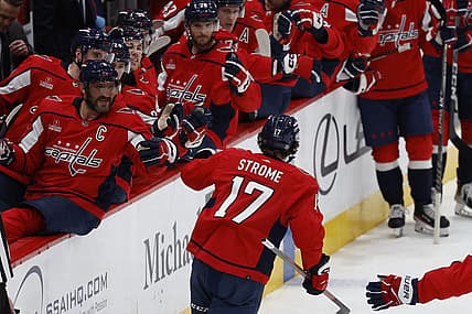 Nov 14, 2023; Washington, District of Columbia, USA; Washington Capitals center Dylan Strome (17) celebrates with teammates after scoring a goal against the Vegas Golden Knights in the first period at Capital One Arena. Mandatory Credit: Geoff Burke-USA TODAY Sports