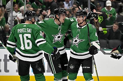 Nov 14, 2023; Dallas, Texas, USA; Dallas Stars center Joe Pavelski (16) and center Roope Hintz (24) and defenseman Miro Heiskanen (4) celebrates a power play goal scored by Hintz against the Arizona Coyotes during the second period at the American Airlines Center. Mandatory Credit: Jerome Miron-USA TODAY Sports