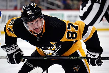 Nov 11, 2023; Pittsburgh, Pennsylvania, USA;  Pittsburgh Penguins center Sidney Crosby (87) prepares to take a face-off against the Buffalo Sabres during the third period at PPG Paints Arena. Mandatory Credit: Charles LeClaire-USA TODAY Sports