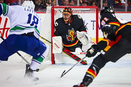 Nov 16, 2023; Calgary, Alberta, CAN; Calgary Flames goaltender Jacob Markstrom (25) guards his net against Vancouver Canuck during the first period at Scotiabank Saddledome. Mandatory Credit: Sergei Belski-USA TODAY Sports