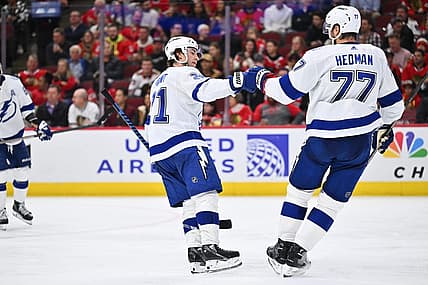 Nov 16, 2023; Chicago, Illinois, USA; Tampa Bay Lightning forward Brayden Point (21) celebrates with defenseman Victor Hedman (77) after scoring a goal in the second period against the Chicago Blackhawks at United Center. Mandatory Credit: Jamie Sabau-USA TODAY Sports
