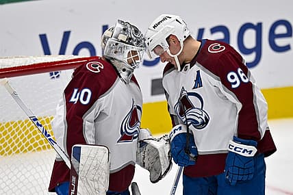 Nov 18, 2023; Dallas, Texas, USA; Colorado Avalanche right wing Mikko Rantanen (96) and goaltender Alexandar Georgiev (40) celebrate after the Avalanche victory over the Dallas Stars at the American Airlines Center. Mandatory Credit: Jerome Miron-USA TODAY Sports