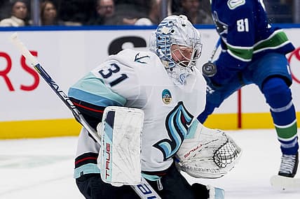 Nov 18, 2023; Vancouver, British Columbia, CAN; Seattle Kraken goalie Philipp Grubauer (31) makes a save against the Seattle Kraken in the first period at Rogers Arena. Mandatory Credit: Bob Frid-USA TODAY Sports