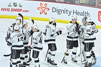 Nov 20, 2023; Tempe, Arizona, USA; The Los Angeles Kings celebrate after beating the Arizona Coyotes 4-1 at Mullett Arena. Mandatory Credit: Matt Kartozian-USA TODAY Sports