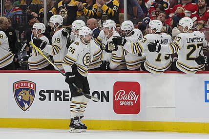 Nov 22, 2023; Sunrise, Florida, USA; Boston Bruins left wing Jake DeBrusk (74) celebrates with teammates after scoring against the Florida Panthers during the second period at Amerant Bank Arena. Mandatory Credit: Sam Navarro-USA TODAY Sports
