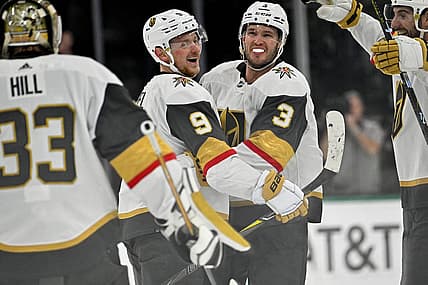 Nov 22, 2023; Dallas, Texas, USA; Vegas Golden Knights center Jack Eichel (9) and defenseman Brayden McNabb (3) and goaltender Adin Hill (33) celebrate after Eichel scores the game winning goal against the Dallas Stars during the overtime period at the American Airlines Center. Mandatory Credit: Jerome Miron-USA TODAY Sports