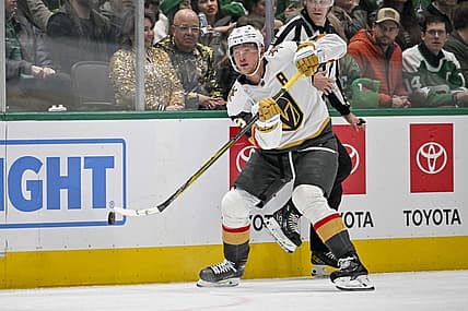 Nov 22, 2023; Dallas, Texas, USA; Vegas Golden Knights center Jack Eichel (9) passes the puck against the Dallas Stars during the third period at the American Airlines Center. Mandatory Credit: Jerome Miron-USA TODAY Sports