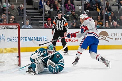 Nov 24, 2023; San Jose, California, USA; Montreal Canadiens right wing Jesse Ylonen (56) shoots the winning goal during the shootout against San Jose Sharks goaltender Mackenzie Blackwood (29) at SAP Center at San Jose. Mandatory Credit: Stan Szeto-USA TODAY Sports