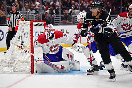 Nov 25, 2023; Los Angeles, California, USA; Montreal Canadiens goaltender Jake Allen (34) defends the goal against Los Angeles Kings center Quinton Byfield (55) during the second period at Crypto.com Arena. Mandatory Credit: Gary A. Vasquez-USA TODAY Sports