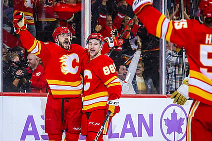 Nov 27, 2023; Calgary, Alberta, CAN; Calgary Flames defenseman MacKenzie Weegar (52) celebrates his goal against the Vegas Golden Knights during the overtime period at Scotiabank Saddledome. Mandatory Credit: Sergei Belski-USA TODAY Sports