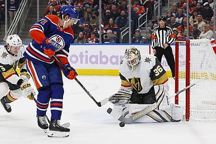 Nov 28, 2023; Edmonton, Alberta, CAN; Vegas Golden Knights goaltender Logan Thompson (36) makes a save on a shot by Edmonton Oilers forward Ryan McLeod (71) during the first period at Rogers Place. Mandatory Credit: Perry Nelson-USA TODAY Sports