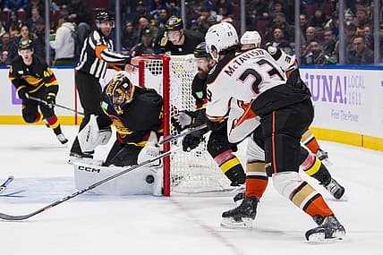 Nov 28, 2023; Vancouver, British Columbia, CAN; Vancouver Canucks goalie Thatcher Demko (35) makes a save on Anaheim Ducks forward Mason McTavish (23) in the third period at Rogers Arena. Vancouver won 3-1. Mandatory Credit: Bob Frid-USA TODAY Sports