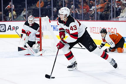 Nov 30, 2023; Philadelphia, Pennsylvania, USA; New Jersey Devils defenseman Luke Hughes (43) skates with the puck against the Philadelphia Flyers during the first period at Wells Fargo Center. Mandatory Credit: Bill Streicher-USA TODAY Sports