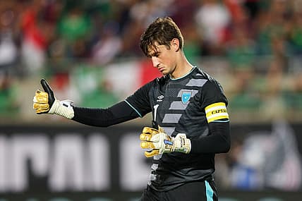 Apr 27, 2022; Orlando, FL, USA; Guatemala goalkeeper Nicholas Hagen (1) reacts after a missed free kick attempt during a match against Mexico at Camping World Stadium. Mandatory Credit: Nathan Ray Seebeck-USA TODAY Sports
