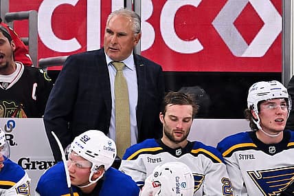 Sep 28, 2023; Chicago, Illinois, USA;  St. Louis Blues head coach Craig Berube watches his team play against the Chicago Blackhawks at United Center. Mandatory Credit: Jamie Sabau-USA TODAY Sports