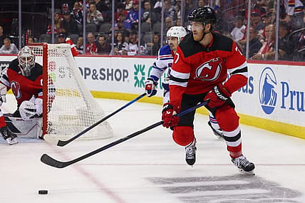 Oct 4, 2023; New York, New Jersey, USA; New Jersey Devils defenseman Dougie Hamilton (7) skates with the puck against the New York Rangers during the first period at Prudential Center. Mandatory Credit: Ed Mulholland-USA TODAY Sports