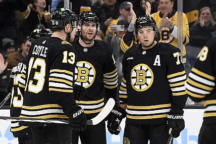 Nov 30, 2023; Boston, Massachusetts, USA; Boston Bruins center Pavel Zacha (18) celebrates his goal with center Charlie Coyle (13) and defenseman Charlie McAvoy (73) during the third period against the San Jose Sharks at TD Garden. Mandatory Credit: Bob DeChiara-USA TODAY Sports