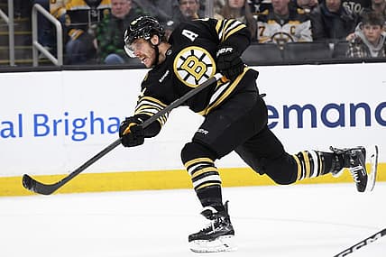 Nov 30, 2023; Boston, Massachusetts, USA; Boston Bruins right wing David Pastrnak (88) shoots the puck during the third period against the San Jose Sharks at TD Garden. Mandatory Credit: Bob DeChiara-USA TODAY Sports