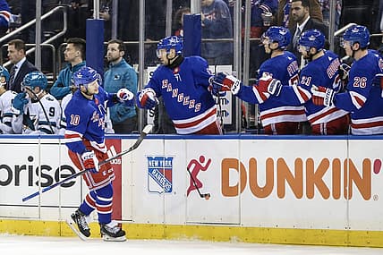 Dec 3, 2023; New York, New York, USA; New York Rangers left wing Artemi Panarin (10) is greeted by his teammates after scoring a goal in the first period against the San Jose Sharks at Madison Square Garden. Mandatory Credit: Wendell Cruz-USA TODAY Sports