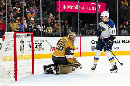 Dec 4, 2023; Las Vegas, Nevada, USA; St. Louis Blues right wing Alexey Toropchenko (13) scores a goal against Vegas Golden Knights goaltender Logan Thompson (36) during the first period at T-Mobile Arena. Mandatory Credit: Stephen R. Sylvanie-USA TODAY Sports