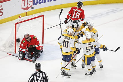 Dec 5, 2023; Chicago, Illinois, USA; Nashville Predators center Ryan O'Reilly (90) celebrates with teammates after scoring against the Chicago Blackhawks during the second period at United Center. Mandatory Credit: Kamil Krzaczynski-USA TODAY Sports