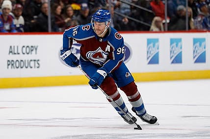 Dec 5, 2023; Denver, Colorado, USA; Colorado Avalanche right wing Mikko Rantanen (96) controls the puck in the second period against the Anaheim Ducks at Ball Arena. Mandatory Credit: Isaiah J. Downing-USA TODAY Sports