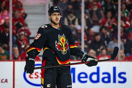 Dec 5, 2023; Calgary, Alberta, CAN; Calgary Flames left wing A.J. Greer (18) during the first period against the Minnesota Wild at Scotiabank Saddledome. Mandatory Credit: Sergei Belski-USA TODAY Sports