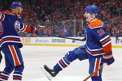 Dec 6, 2023; Edmonton, Alberta, CAN; Edmonton Oilers forward Zach Hyman (18) celebrates after scoring a goal against the Carolina Hurricanes during the first period at Rogers Place. Mandatory Credit: Perry Nelson-USA TODAY Sports