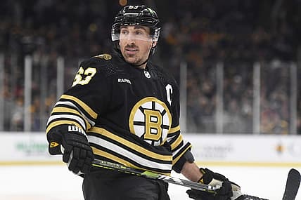 Dec 7, 2023; Boston, Massachusetts, USA; Boston Bruins left wing Brad Marchand (63) looks over at the linesman after an offside call during the first period against the Buffalo Sabres at TD Garden. Mandatory Credit: Bob DeChiara-USA TODAY Sports