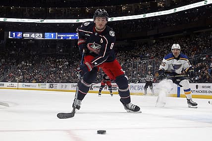 Dec 8, 2023; Columbus, Ohio, USA; Columbus Blue Jackets defenseman Zach Werenski (8) tracks down a loose puck against the St. Louis Blues during the first period at Nationwide Arena. Mandatory Credit: Russell LaBounty-USA TODAY Sports