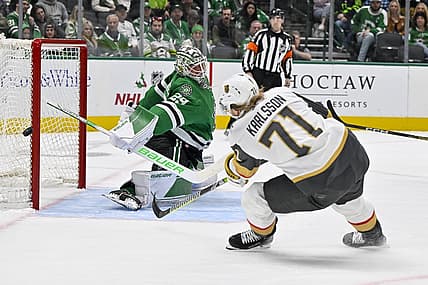 Dec 9, 2023; Dallas, Texas, USA; Dallas Stars goaltender Jake Oettinger (29) stops a breakaway shot by Vegas Golden Knights center William Karlsson (71) during the first period at the American Airlines Center. Mandatory Credit: Jerome Miron-USA TODAY Sports