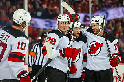 Dec 9, 2023; Calgary, Alberta, CAN; New Jersey Devils right wing Timo Meier (28) celebrates his goal with teammates against the Calgary Flames during the third period at Scotiabank Saddledome. Mandatory Credit: Sergei Belski-USA TODAY Sports