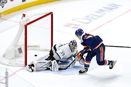 Dec 9, 2023; Elmont, New York, USA; New York Islanders center Jean-Gabriel Pageau (44) scores the game winning goal in overtime against Los Angeles Kings goaltender Cam Talbot (39) at UBS Arena. Mandatory Credit: John Jones-USA TODAY Sports