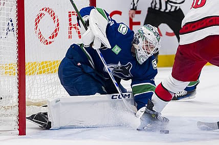 Dec 9, 2023; Vancouver, British Columbia, CAN; Vancouver Canucks goalie Thatcher Demko (35) makes a save against the Carolina Hurricanes in the second period at Rogers Arena. Mandatory Credit: Bob Frid-USA TODAY Sports