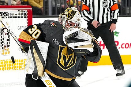 Dec 10, 2023; Las Vegas, Nevada, USA; Vegas Golden Knights goaltender Jiri Patera (30) makes a save against the San Jose Sharks during the first period at T-Mobile Arena. Mandatory Credit: Stephen R. Sylvanie-USA TODAY Sports