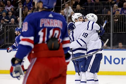 Dec 12, 2023; New York, New York, USA; Toronto Maple Leafs center Calle Jarnkrok (19) celebrates his goal against the New York Rangers with center John Tavares (91) during the first period at Madison Square Garden. Mandatory Credit: Brad Penner-USA TODAY Sports