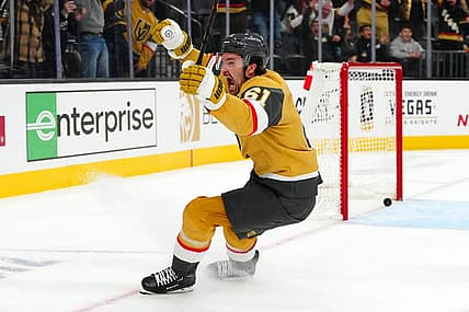 Dec 12, 2023; Las Vegas, Nevada, USA; Vegas Golden Knights right wing Mark Stone (61) celebrates after scoring a goal against Calgary Flames goaltender Dustin Wolf (32) during an overtime period to give the Golden Knights a 5-4 victory at T-Mobile Arena. Mandatory Credit: Stephen R. Sylvanie-USA TODAY Sports