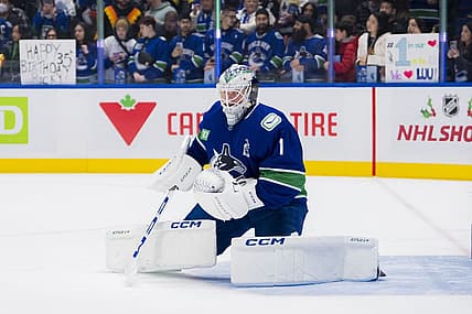 Dec 14, 2023; Vancouver, British Columbia, CAN; Vancouver Canucks goalie Thatcher Demko (35) warms up wearing Roberto Luongo   s number 1 jersey prior to an on ice presentation before a game against the Florida Panthers the Canucks celebrate and honour the career of former Vancouver goalie Roberto Luongo.  There will be a ceremony for Luongo inducting him into the Vancouver Canucks Ring of Honour at Rogers Arena. Mandatory Credit: Bob Frid-USA TODAY Sports