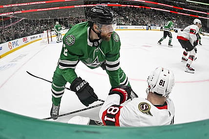 Dec 15, 2023; Dallas, Texas, USA; Dallas Stars defenseman Jani Hakanpaa (2) checks Ottawa Senators left wing Dominik Kubalik (81) during the second period at the American Airlines Center. Mandatory Credit: Jerome Miron-USA TODAY Sports