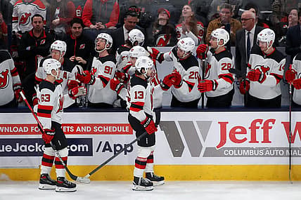 Dec 16, 2023; Columbus, Ohio, USA; New Jersey Devils center Nico Hischier (13) celebrates his goal with teammates during the third period against the Columbus Blue Jackets at Nationwide Arena. Mandatory Credit: Joseph Maiorana-USA TODAY Sports