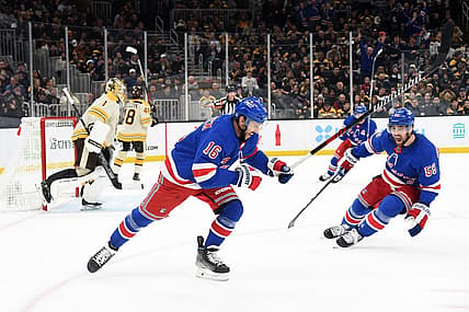 Dec 16, 2023; Boston, Massachusetts, USA;  New York Rangers defenseman Erik Gustafsson (56) reacts on an overtime goal by center Vincent Trocheck (16) against the Boston Bruins at TD Garden. Mandatory Credit: Bob DeChiara-USA TODAY Sports