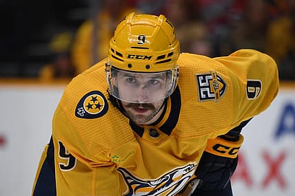 Dec 16, 2023; Nashville, Tennessee, USA; Nashville Predators left wing Filip Forsberg (9) waits for a face off during the third period against the Washington Capitals at Bridgestone Arena. Mandatory Credit: Christopher Hanewinckel-USA TODAY Sports