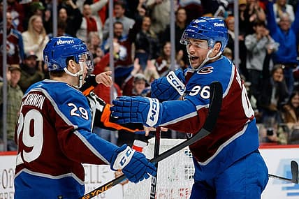 Dec 17, 2023; Denver, Colorado, USA; Colorado Avalanche center Nathan MacKinnon (29) celebrates his goal with right wing Mikko Rantanen (96) in the second period against the San Jose Sharks at Ball Arena. Mandatory Credit: Isaiah J. Downing-USA TODAY Sports