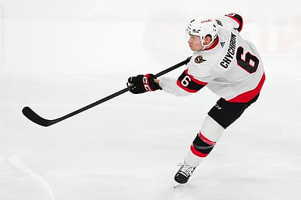 Dec 17, 2023; Las Vegas, Nevada, USA; Ottawa Senators defenseman Jakob Chychrun (6) shoots against the Vegas Golden Knights during the third period at T-Mobile Arena. Mandatory Credit: Stephen R. Sylvanie-USA TODAY Sports
