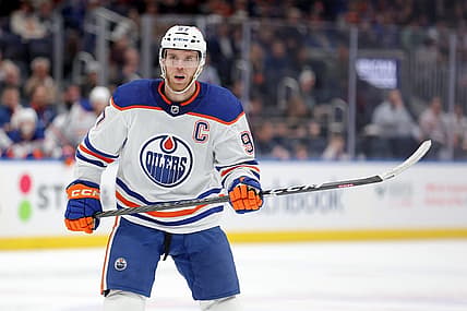 Dec 19, 2023; Elmont, New York, USA; Edmonton Oilers center Connor McDavid (97) skates against the New York Islanders during the first period at UBS Arena. Mandatory Credit: Brad Penner-USA TODAY Sports