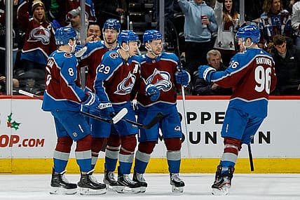 Dec 21, 2023; Denver, Colorado, USA; Colorado Avalanche center Nathan MacKinnon (29) celebrates his goal with defenseman Cale Makar (8) and right wing Valeri Nichushkin (13) and left wing Jonathan Drouin (27) and right wing Mikko Rantanen (96) in the first period against the Ottawa Senators at Ball Arena. Mandatory Credit: Isaiah J. Downing-USA TODAY Sports