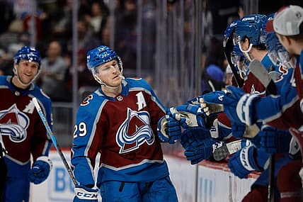 Dec 21, 2023; Denver, Colorado, USA; Colorado Avalanche center Nathan MacKinnon (29) celebrates with the bench after his fourth goal of the game against the Ottawa Senators at Ball Arena. Mandatory Credit: Isaiah J. Downing-USA TODAY Sports